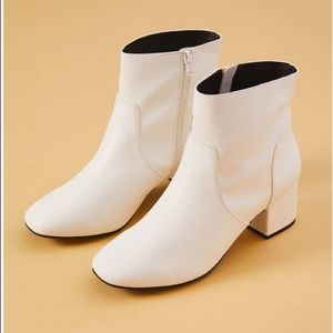White faux leather ankle boot